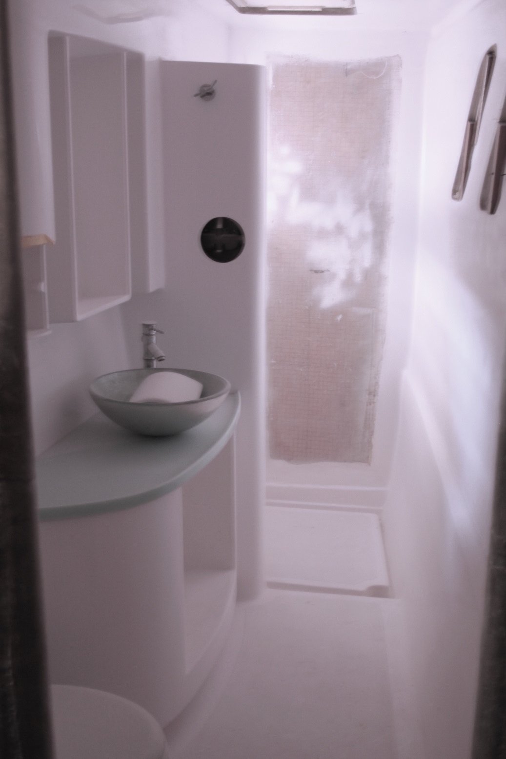The huge shower and heads will feature painted glass artwork